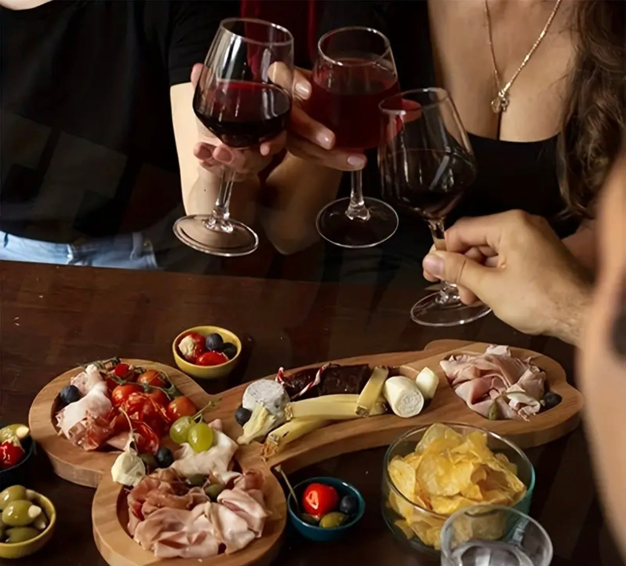 A wooden charcuterie board cut in the shape of a penis. www.VALGINA.com