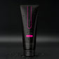 Black tube of VULUXE hair product with pink accents on a dark background. Vuluxe Coochy Shave Cream Rash free dirty french by pure romance www.VALGINA.com 