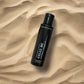 Pure Romance Knead me massage oil with flip top pop top lid sparkling waves and citrus zest fragrance on beach sand www.VALGINA.com 