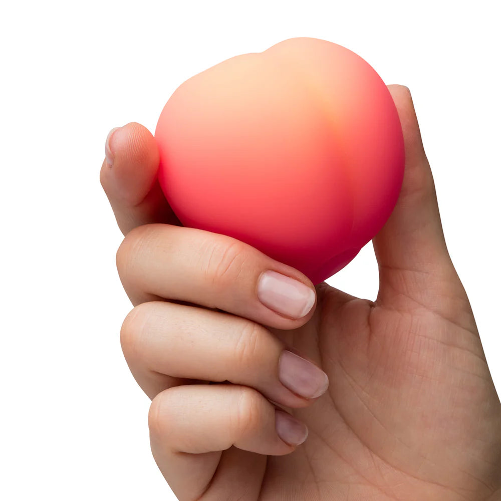 Pink Peach Romp vibrator with charging cable - ValGina.com