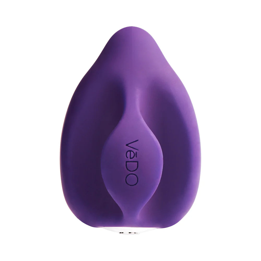 Turquoise blue Between the Fingers discreet finger vibrator held in hand