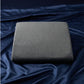 Position Wedge – Support Cushion for Elevated Intimacy. A gray wedge-shaped position wedge cushion with a soft, machine-washable cover. Best Couples sex pillow for positioning www.VALGINA.com 