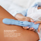 Blue silicone tool being held against a person's leg with text describing its features. t.o.m triple orgasm machine dual rabbit vibrator pure romance www.VALGINA.com 